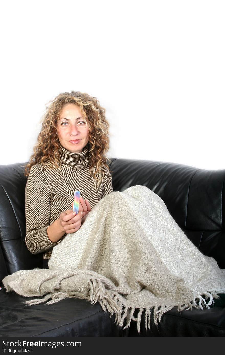 Digital photo of a woman manicures her nails.