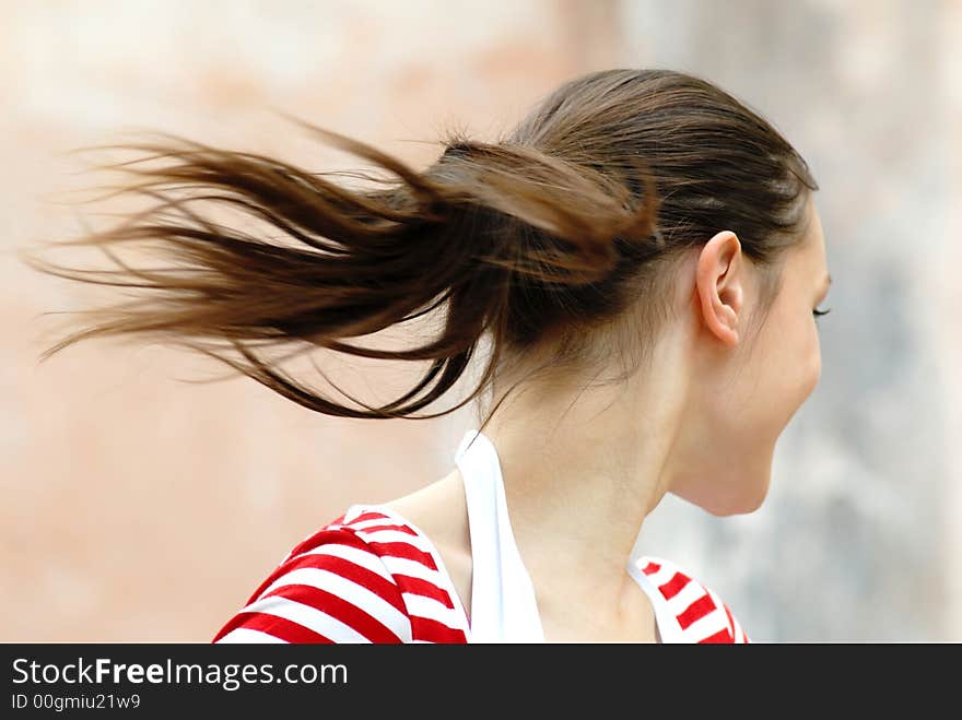 Close up, developing hair of girl in movement. Close up, developing hair of girl in movement