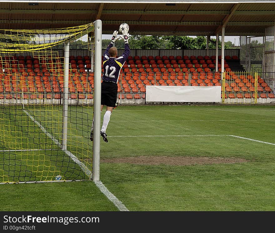 Goalkeaper. shot on goal. soccer match