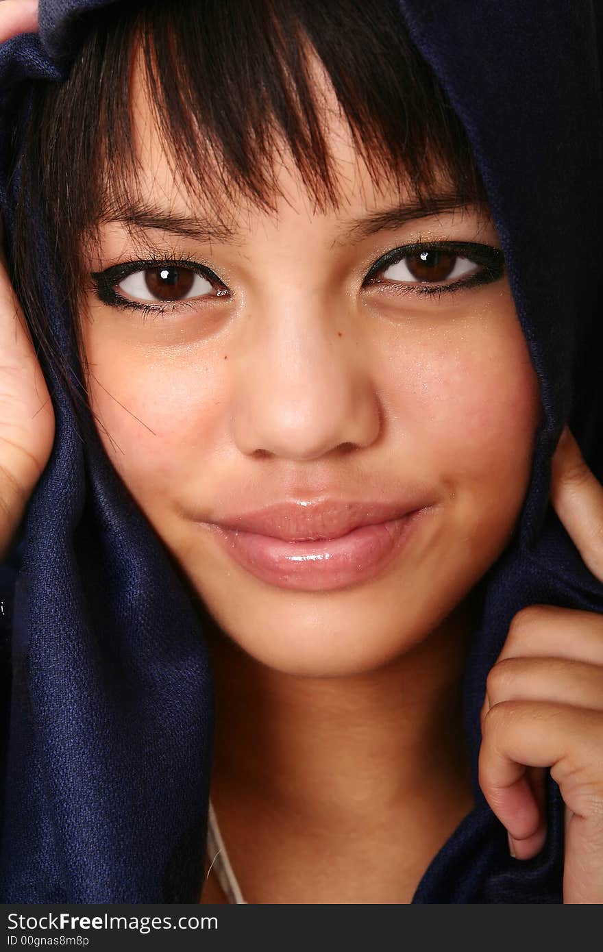 Close up face of beautiful brunette smiling. very sharp eye. Close up face of beautiful brunette smiling. very sharp eye