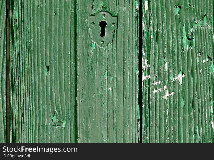 Detail of an old green door