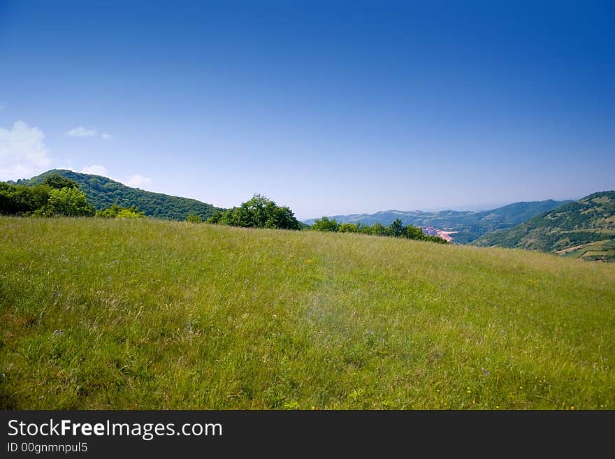 Meadow on a hill and blue sky in spring. Meadow on a hill and blue sky in spring