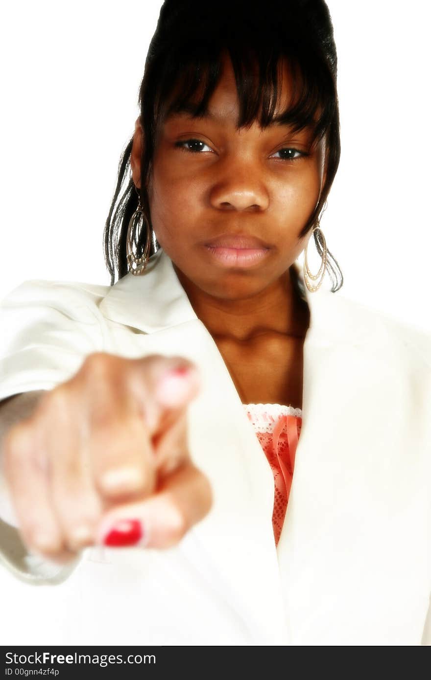 Beautiful African American teen girl pointing, serious expression. Beautiful African American teen girl pointing, serious expression.