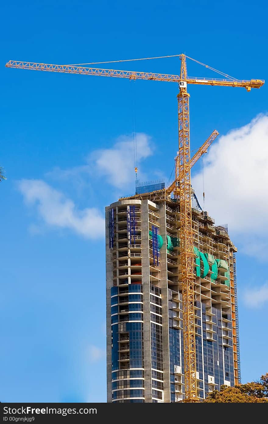 New unfinished skyscraper being erected in downtown. New unfinished skyscraper being erected in downtown