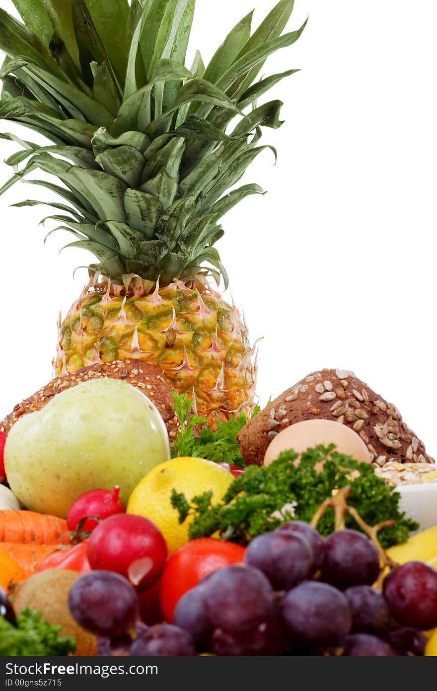 Fresh Vegetables, Fruits and other foodstuffs. Shot in a studio. Fresh Vegetables, Fruits and other foodstuffs. Shot in a studio.