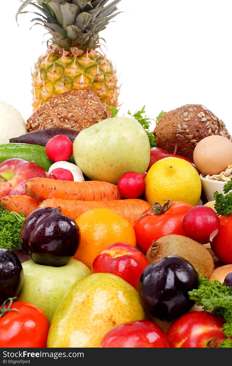 Fresh Vegetables, Fruits and other foodstuffs. Shot in a studio. Fresh Vegetables, Fruits and other foodstuffs. Shot in a studio.