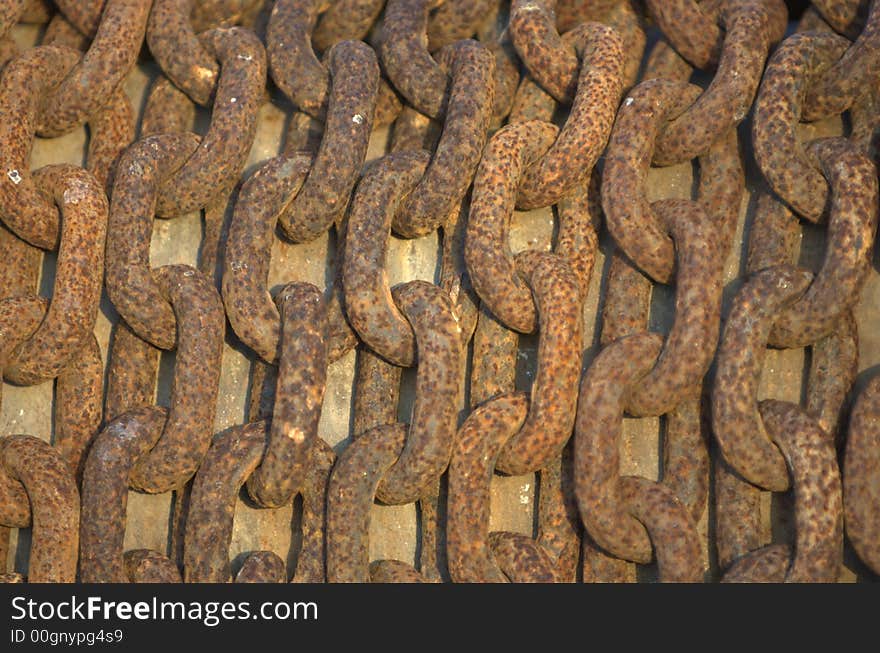 Old chain suffering the elements, now all rusty. Old chain suffering the elements, now all rusty