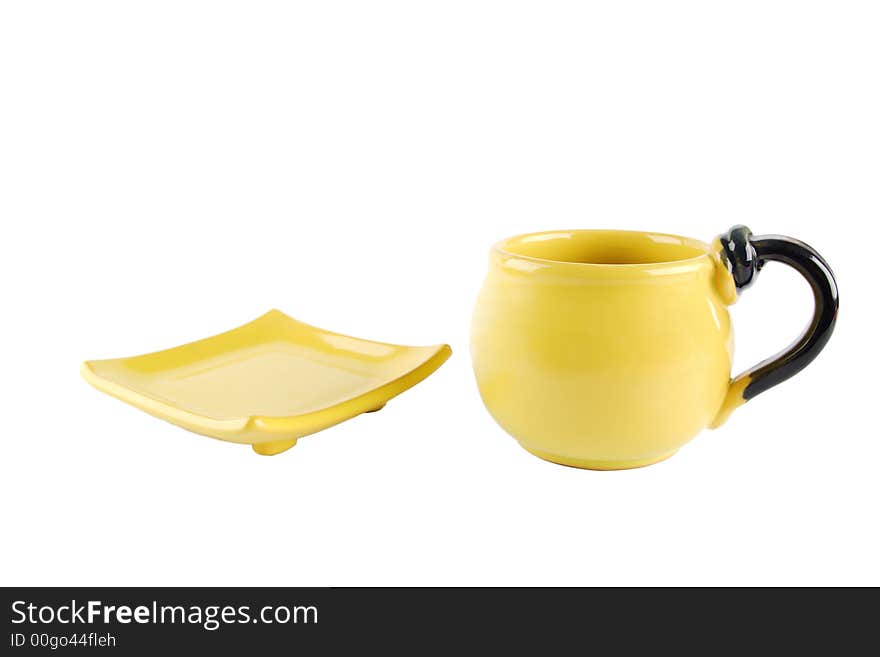 Yellow cup and saucer