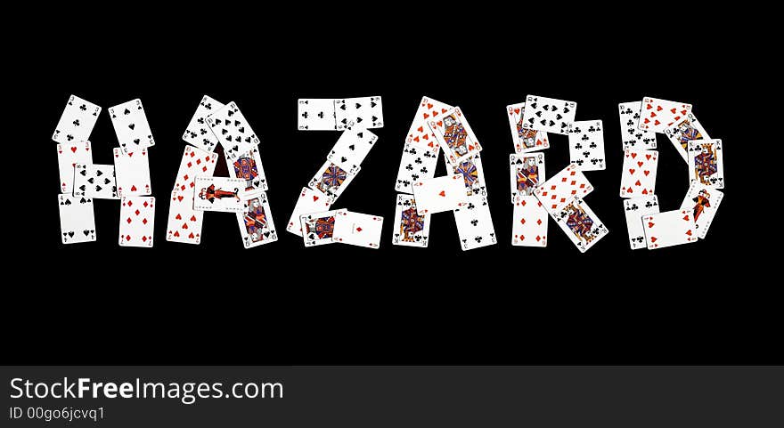 Hazard word created by playing cards on black background