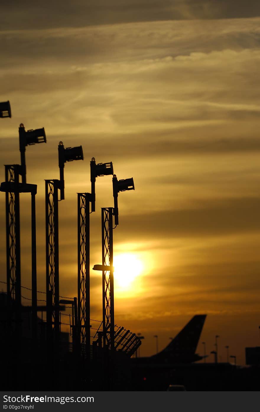 Landing lights and sunset in an airport. Landing lights and sunset in an airport