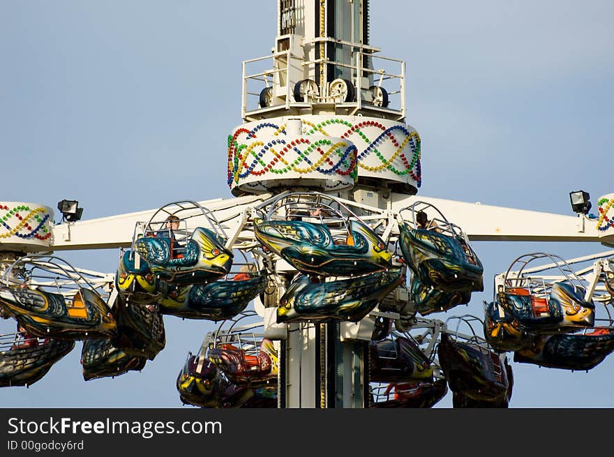 Amusement park ride on a sunny afternoon