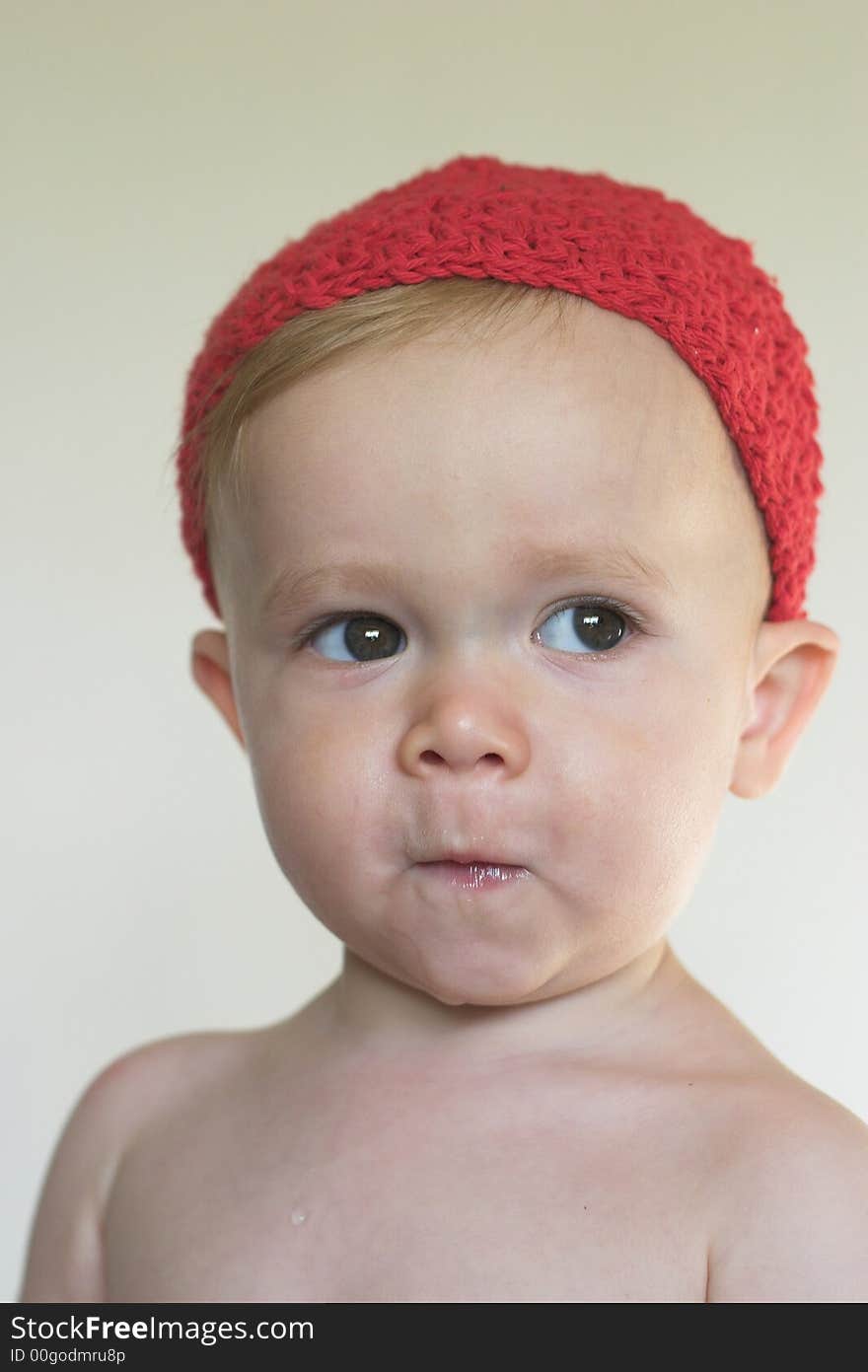 Image of cute toddler wearing a crochet cap