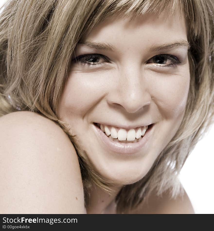 A young caucasian woman portrait taken in the studio on a white background. A young caucasian woman portrait taken in the studio on a white background