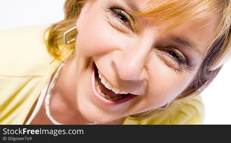 A adult caucasian woman portrait taken in the studio on a white background. A adult caucasian woman portrait taken in the studio on a white background