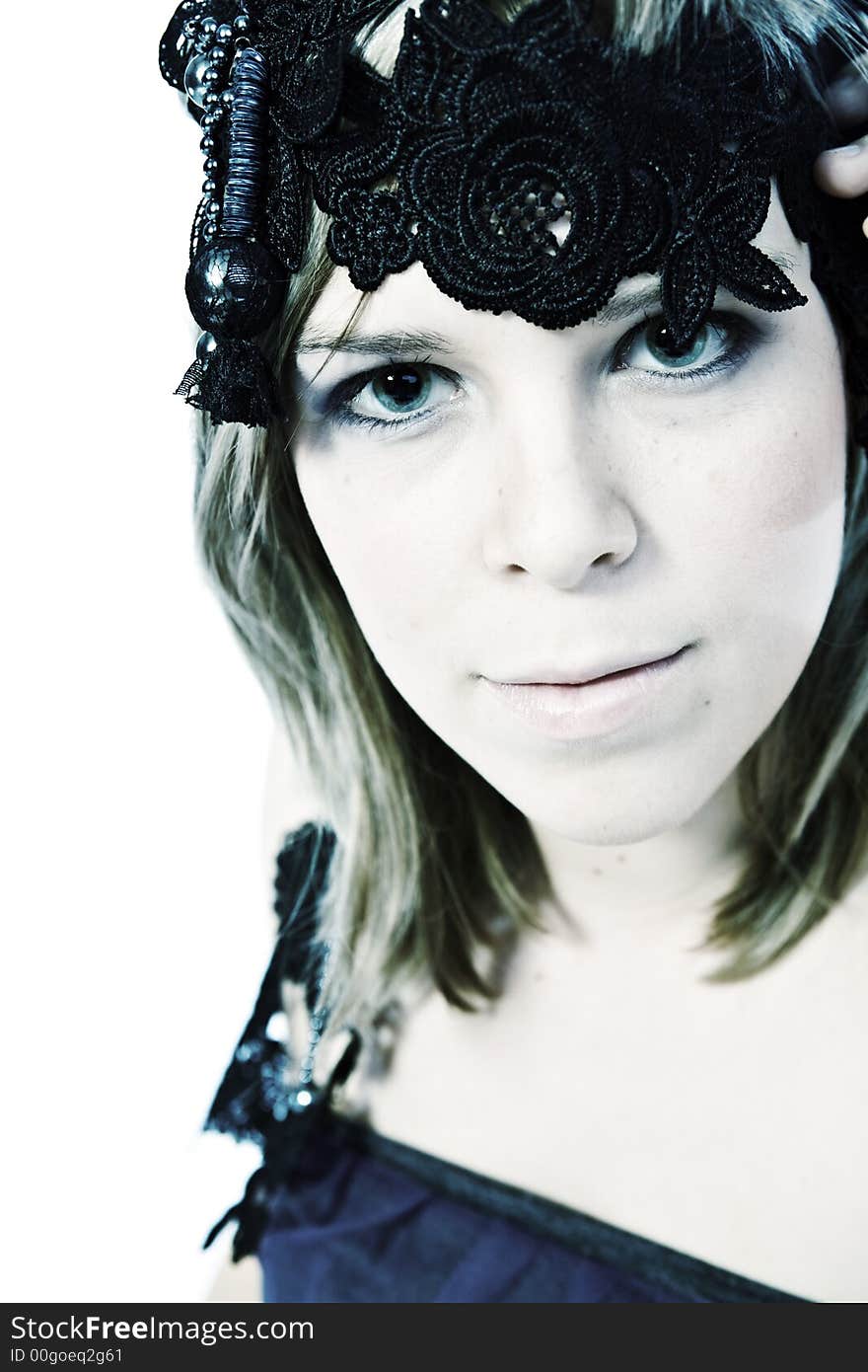 A young caucasian woman portrait taken in the studio on a white background. A young caucasian woman portrait taken in the studio on a white background