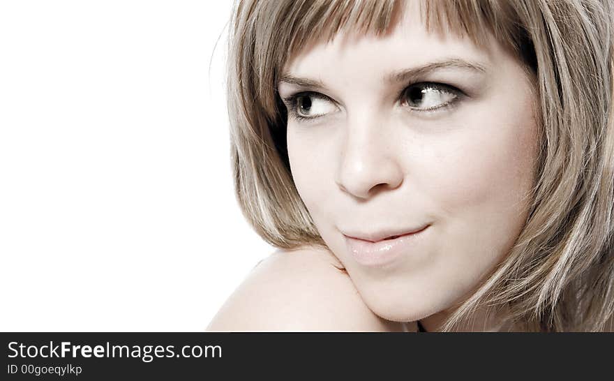 A young caucasian woman portrait taken in the studio on a white background. A young caucasian woman portrait taken in the studio on a white background