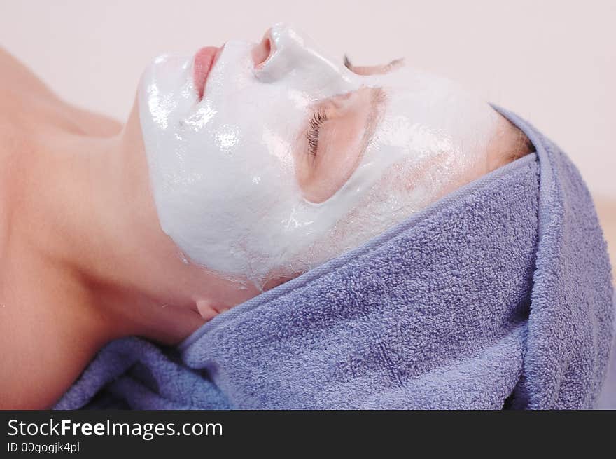 Refreshing mask to the face and beautiful woman. Refreshing mask to the face and beautiful woman