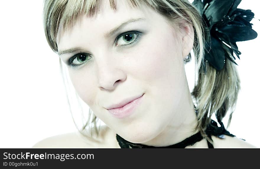 A young caucasian woman portrait taken in the studio on a white background. A young caucasian woman portrait taken in the studio on a white background