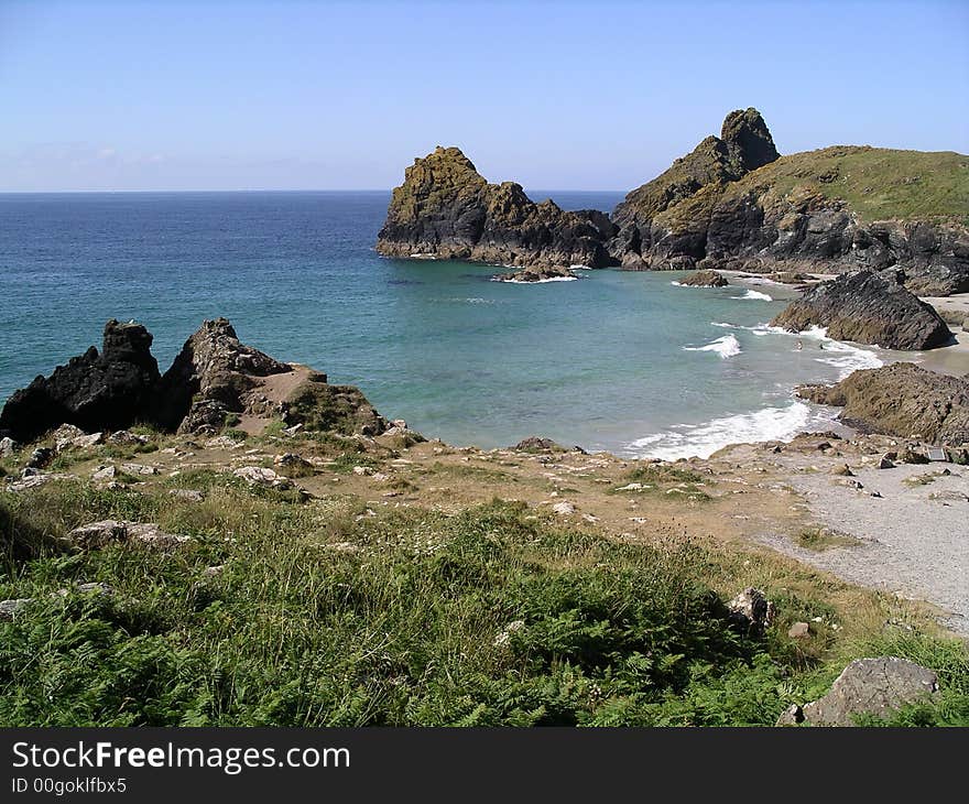 Summer 06 photo of a National Trust beach in Cornwall England called Kynance Cove.  One of the most beautiful places in England. Summer 06 photo of a National Trust beach in Cornwall England called Kynance Cove.  One of the most beautiful places in England.