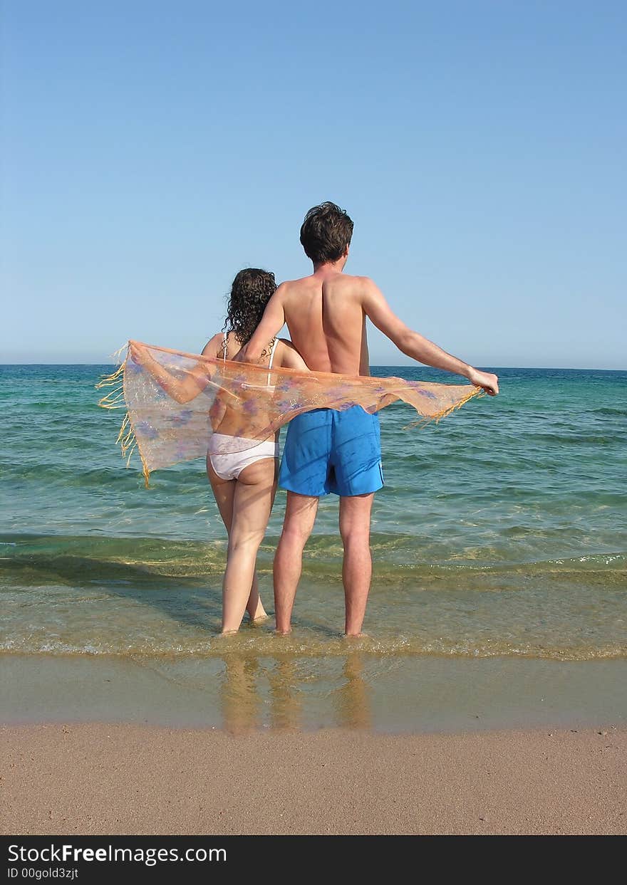 Man and woman near the sea. Man and woman near the sea