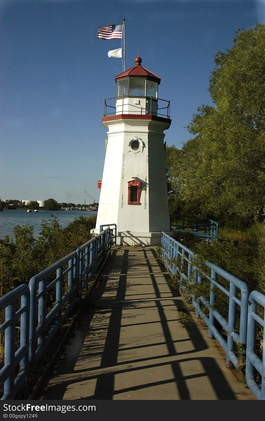 Old historic lighthouse on Lake Michigan on a summer morning with a west wind. Old historic lighthouse on Lake Michigan on a summer morning with a west wind