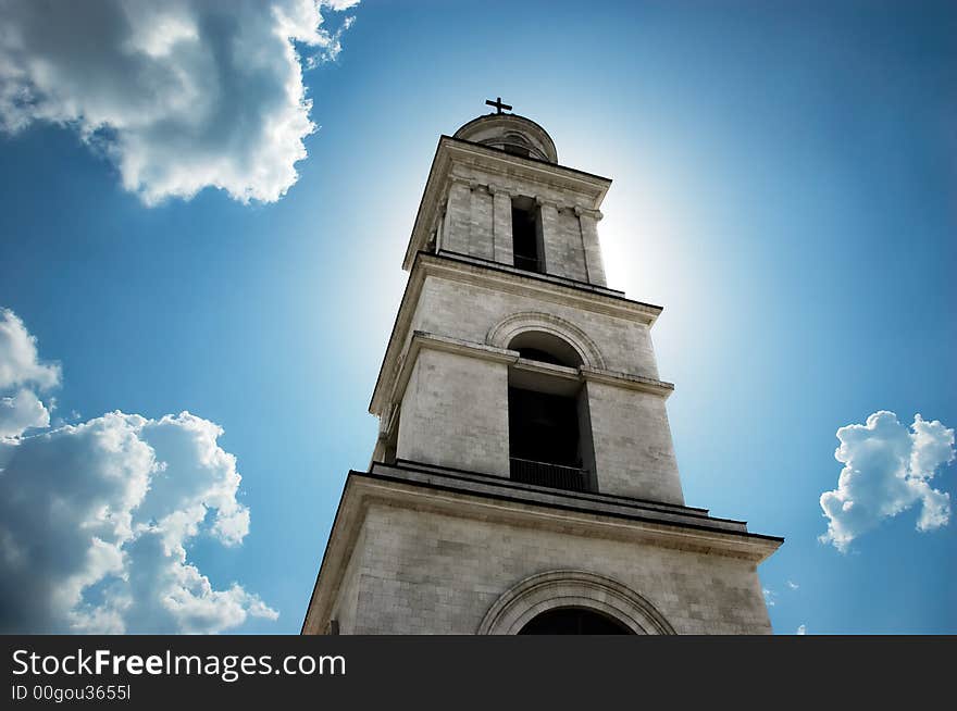 Sun behind the bell tower