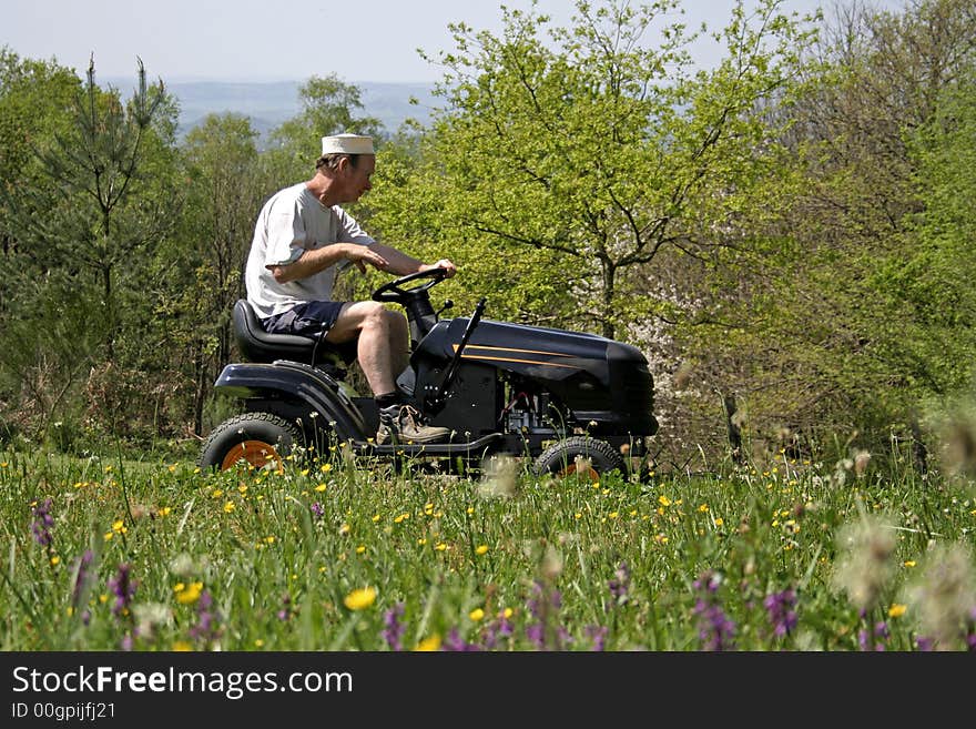 Man sitting on lawnmover