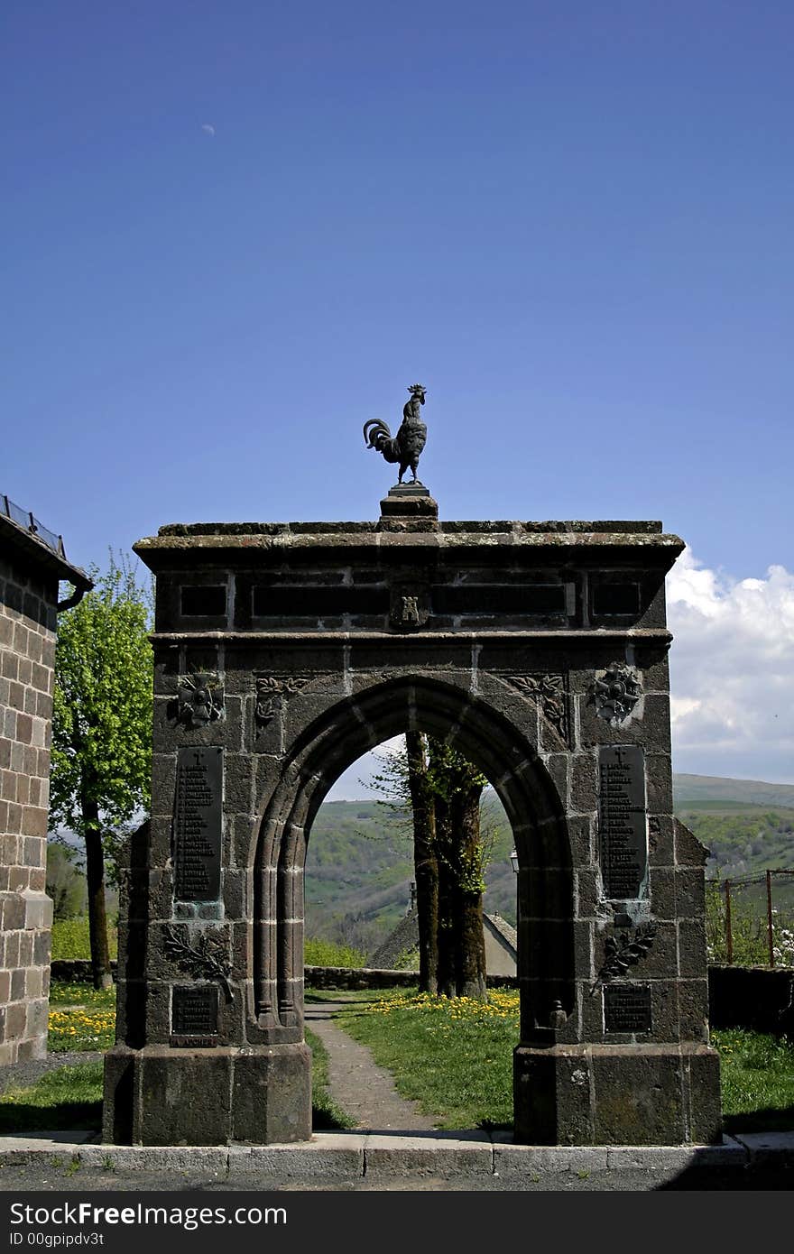 Cock standing  stones archway