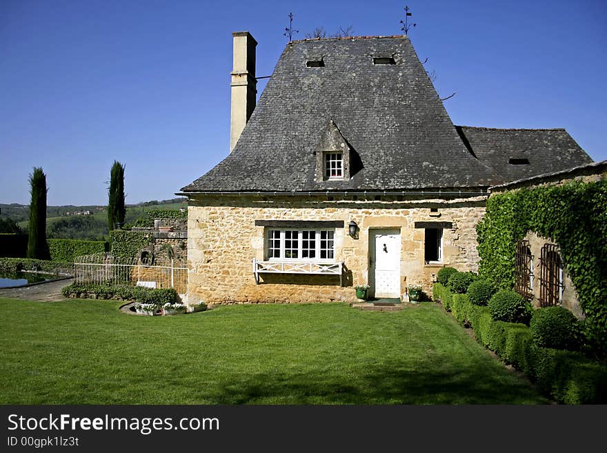 Old renovated stone house and garden