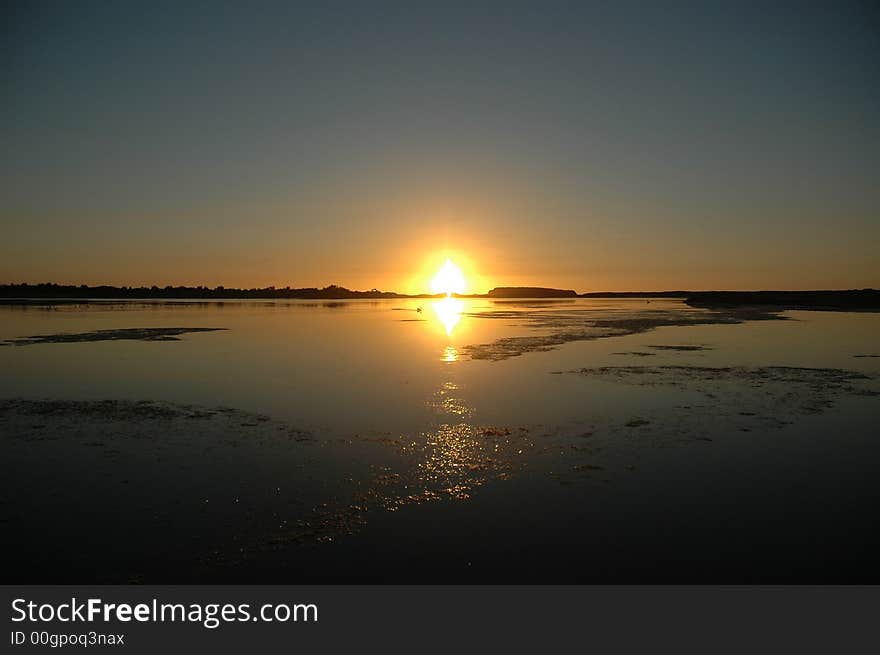 Sunrise reflection in the Lake Illawarra NSW Australia