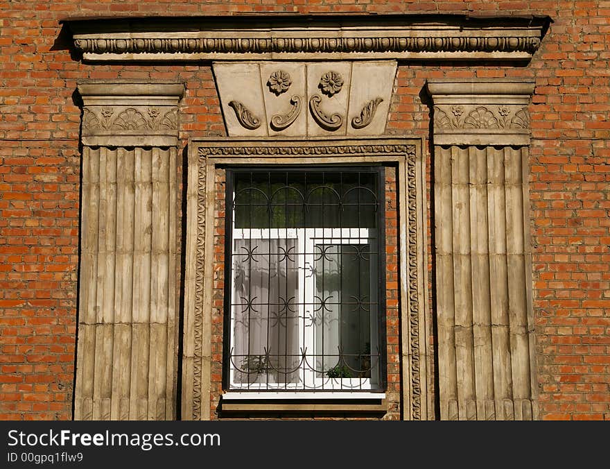 old window with architectural decor. old window with architectural decor