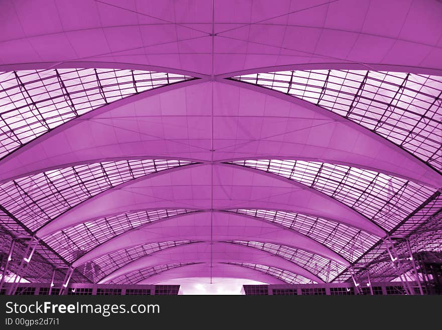 Metallic and glass roof structure