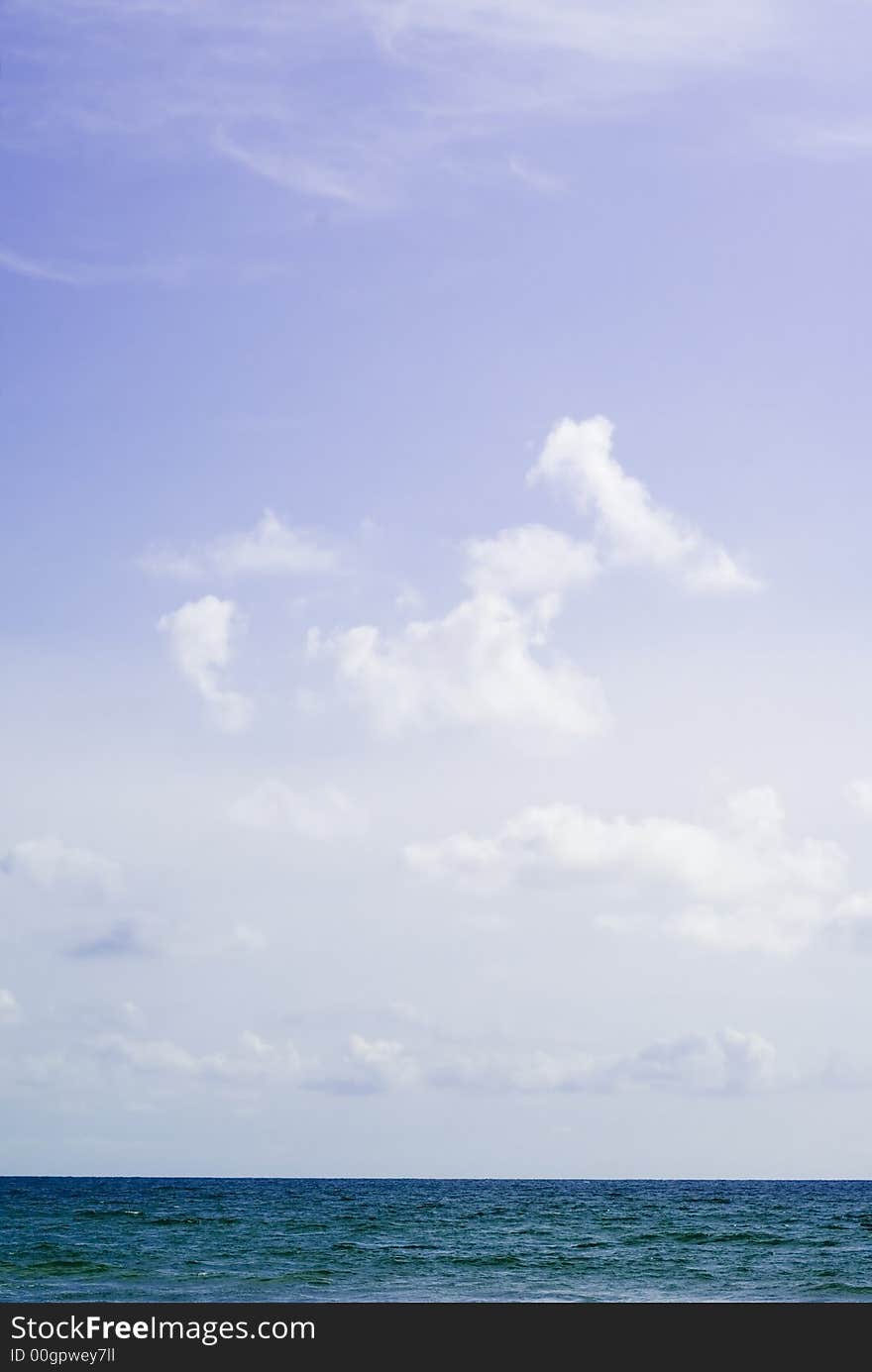 Sea, sky and clouds in a clean composition. Sea, sky and clouds in a clean composition