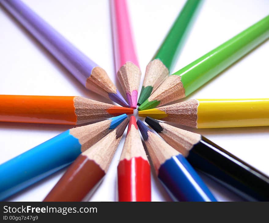 The colourful pencils on white background. The colourful pencils on white background.