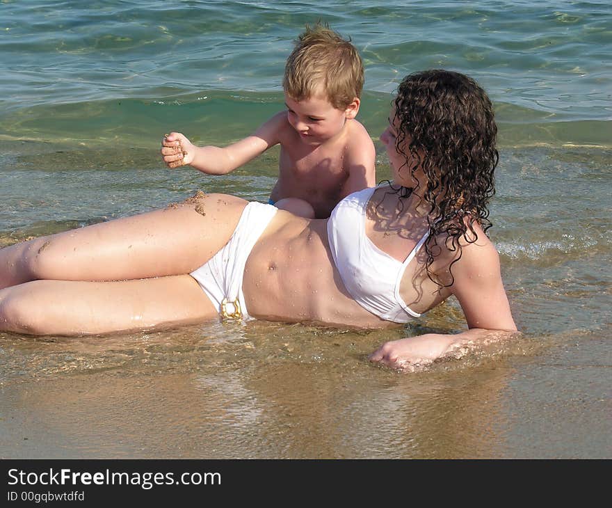 Mother and son on a beach