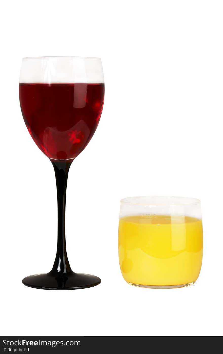 Glass with wine and a glass with juice on a white background. Glass with wine and a glass with juice on a white background