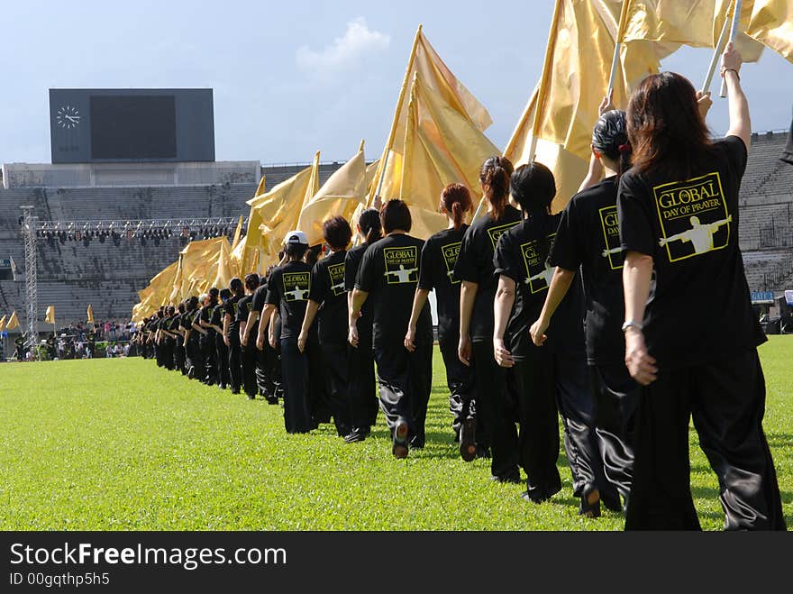 Performers practicing in the stadium