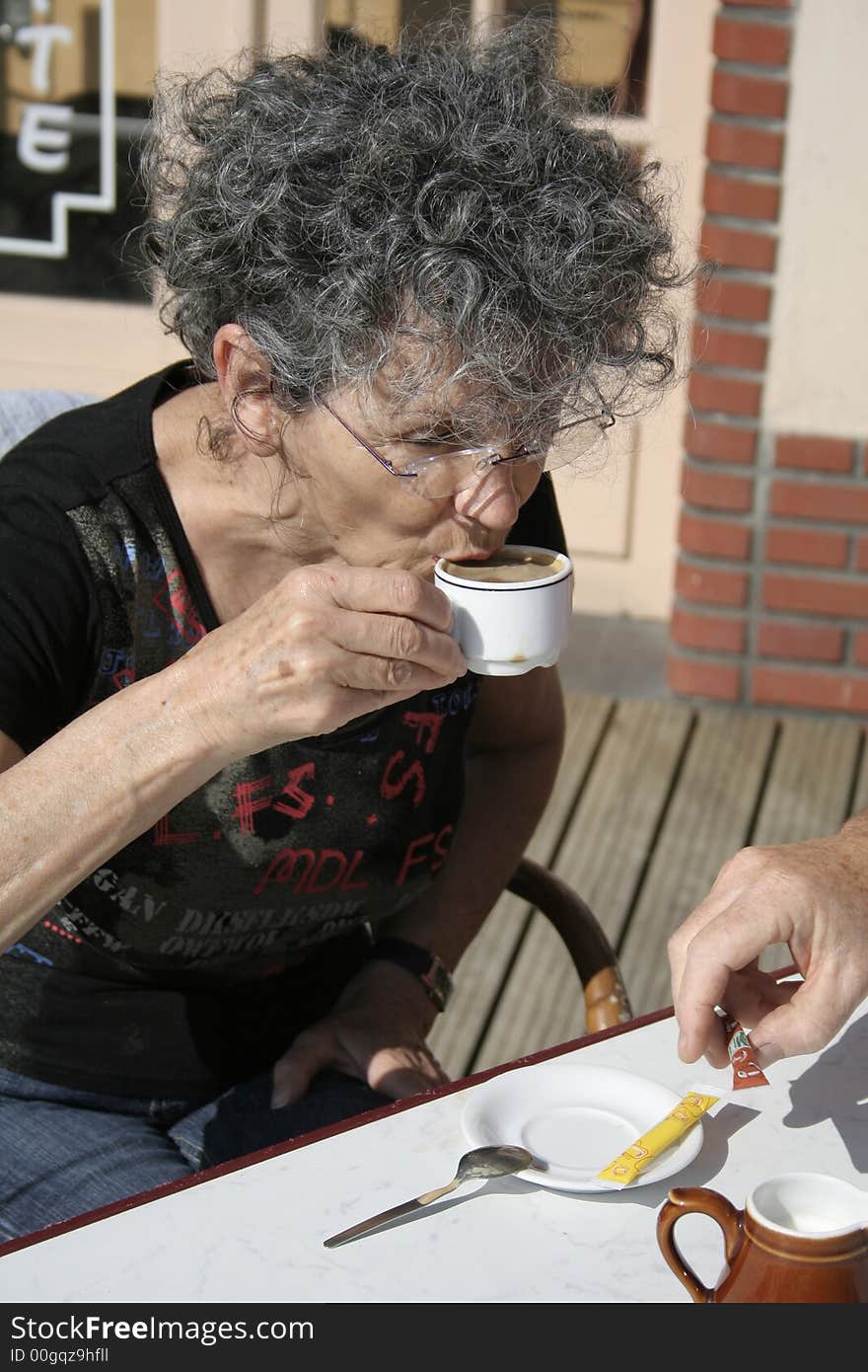 Woman Drinking A  Coffee