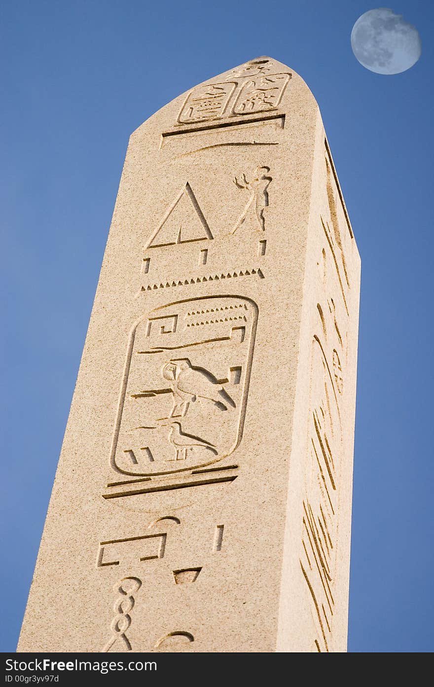 Obelisk under the moon