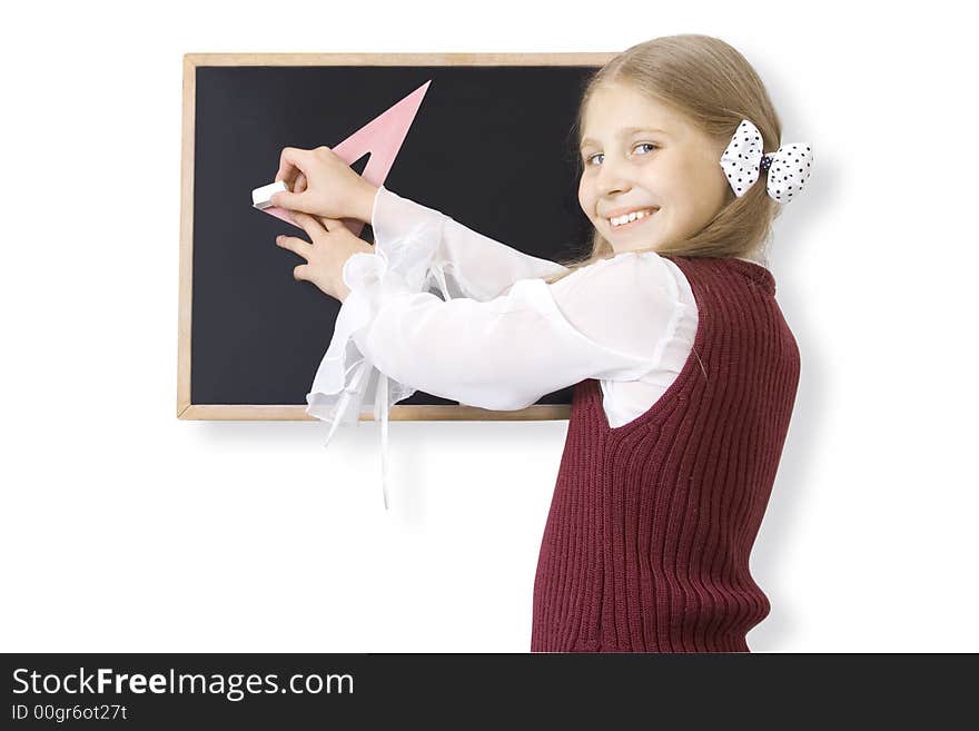 The pupil near a blackboard. The pupil near a blackboard