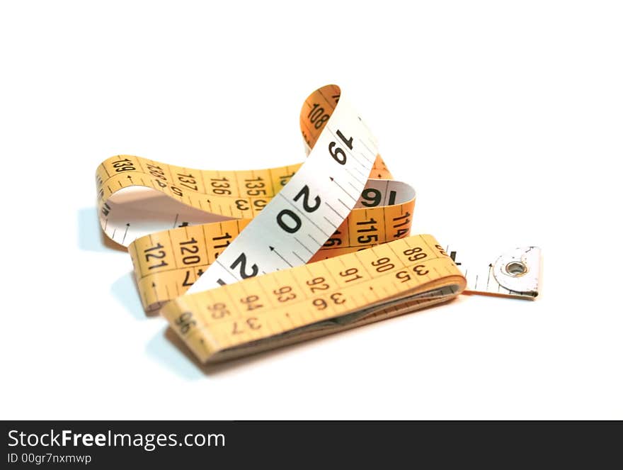 Isolated orange and white colored measuring tape