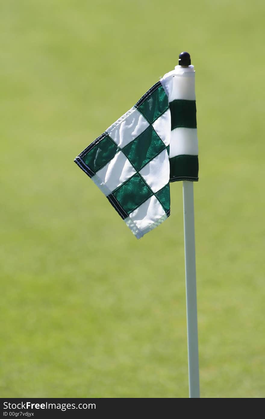 Flag On The lawn at the Golf course