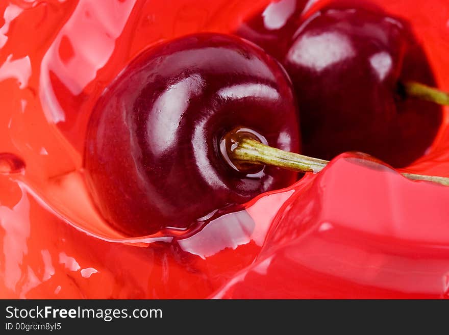 Jelly from a sweet cherry background-cooled entertainment in hot day. Jelly from a sweet cherry background-cooled entertainment in hot day