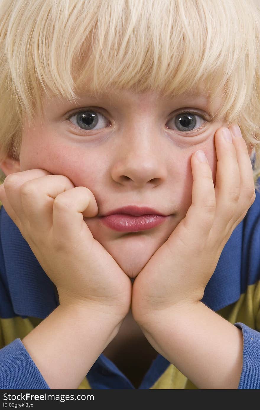 Cute blond little boy portrait