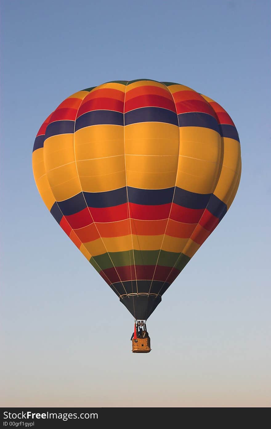 Hot air balloon with multiple colors in flight