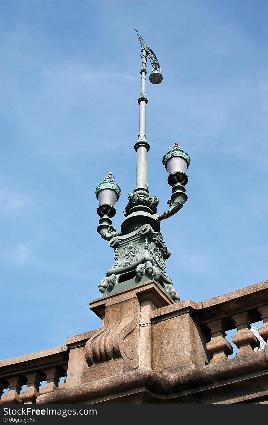 Vintage lamp post on an old city bridge