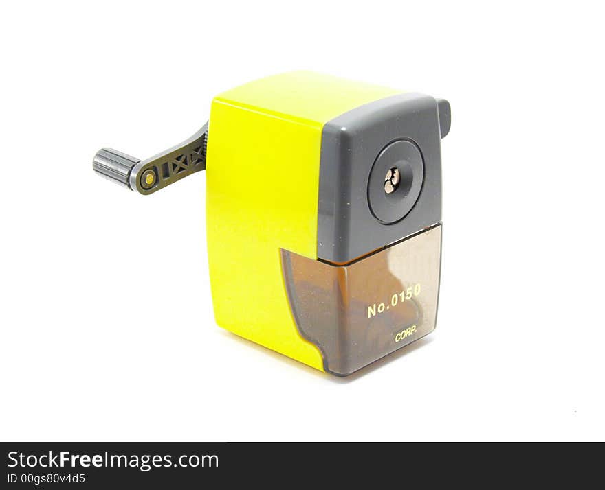 Yellow sharpener on a white background