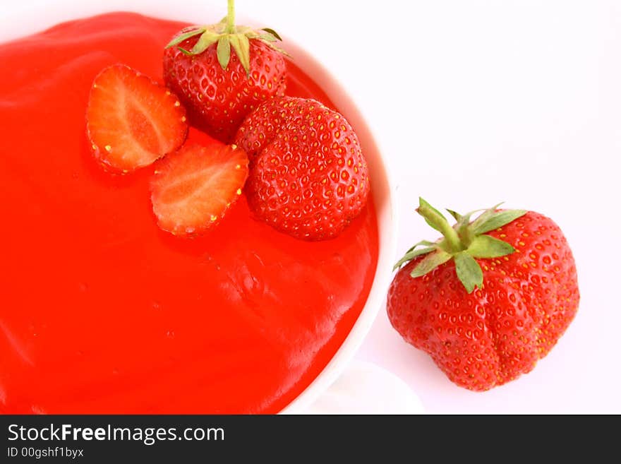 Strawberry Jam on a white background-red strawberry. Strawberry Jam on a white background-red strawberry