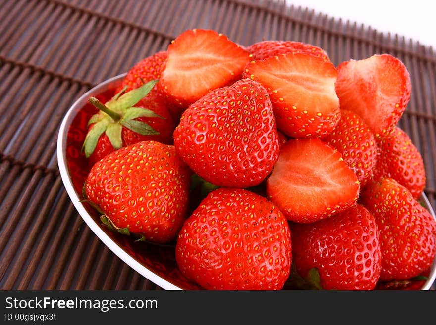 Bunch of red strawberries isolated over white. Bunch of red strawberries isolated over white