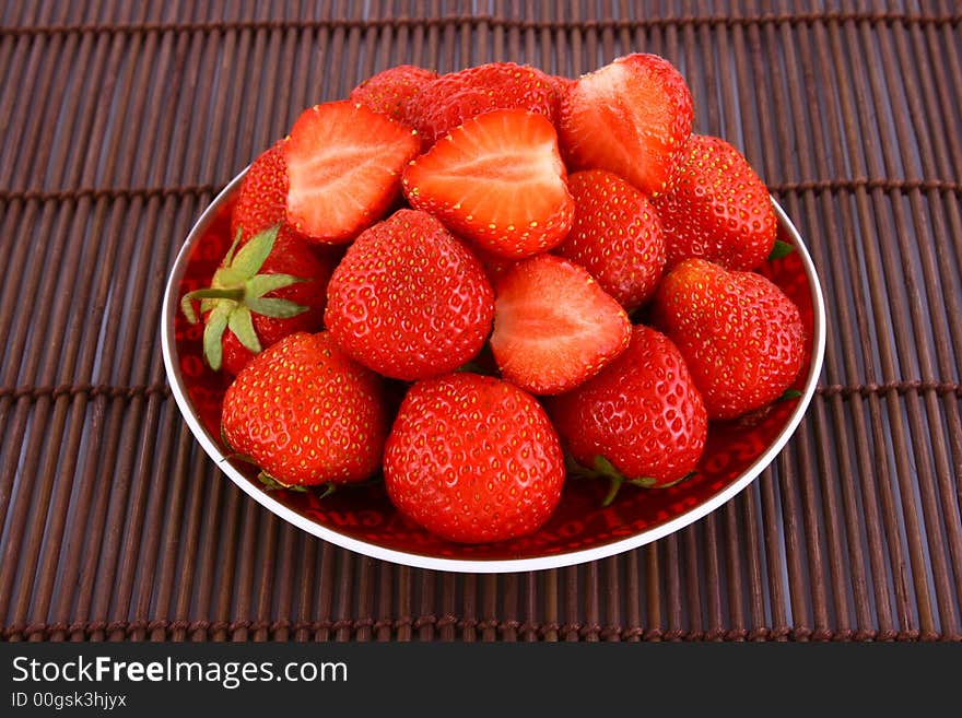 Bunch of red strawberries isolated over white. Bunch of red strawberries isolated over white